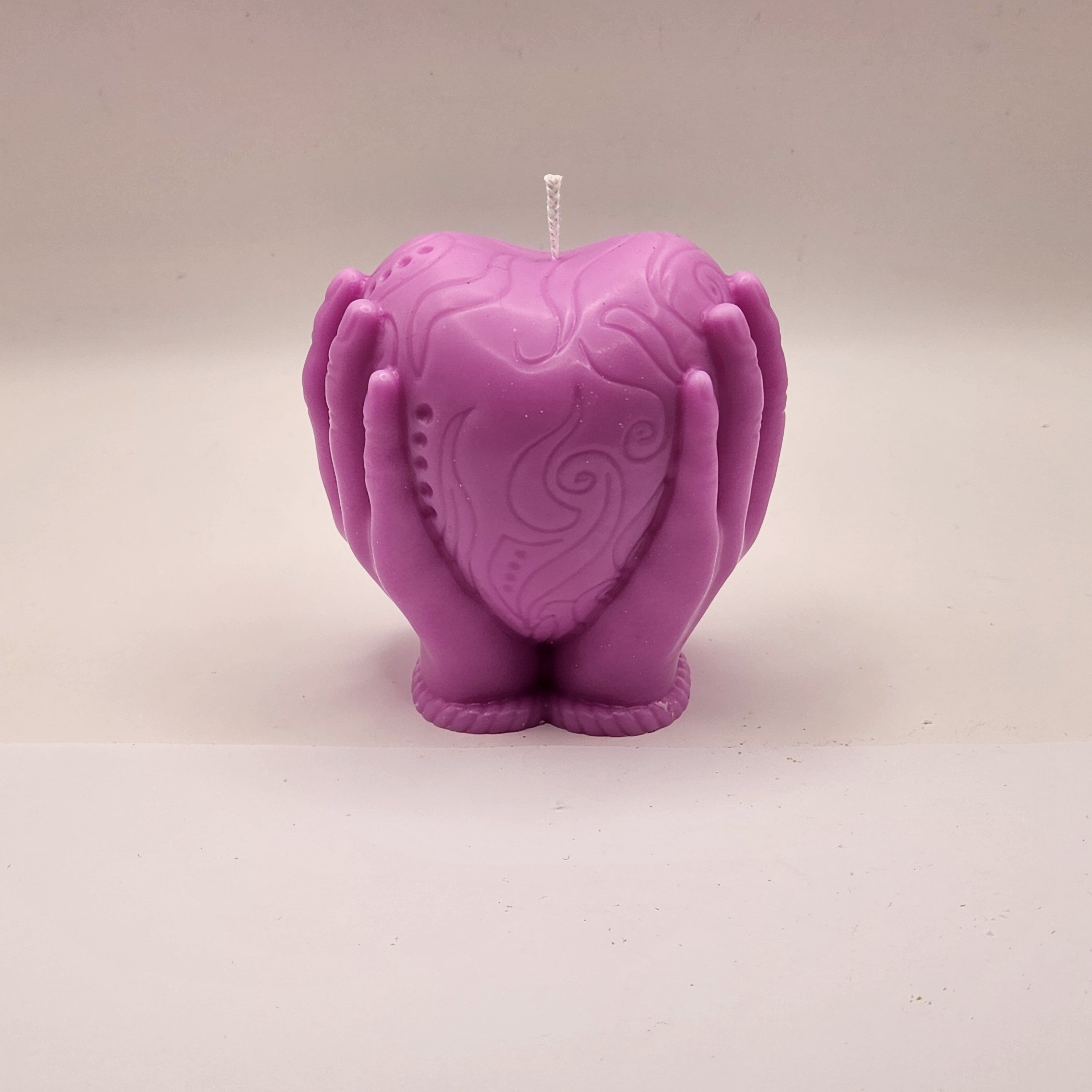 Südant hoidvad käed