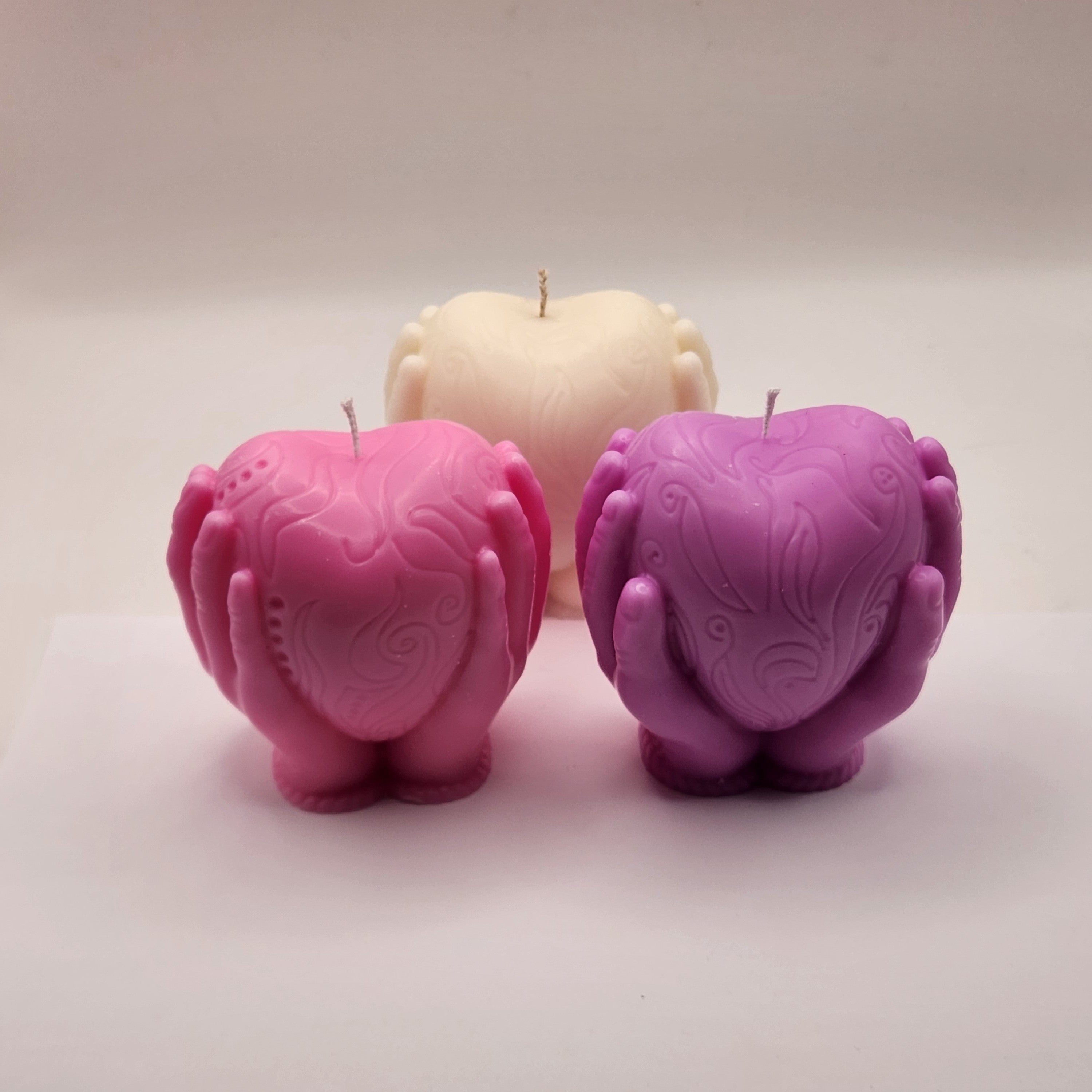 Südant hoidvad käed